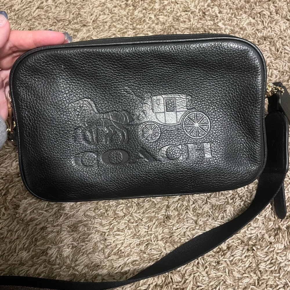 Coach Crossbody Purse with a black and silver striped strap